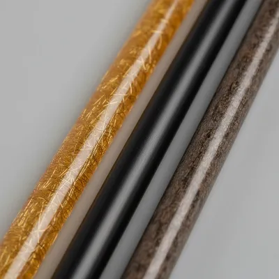 Close-up of fishing rod blanks made of fiberglass, graphite, and composite materials
